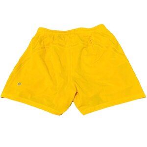 LULULEMON PACE BREAKER LINERLESS 5" SMALL LIKE NEW YELLOW